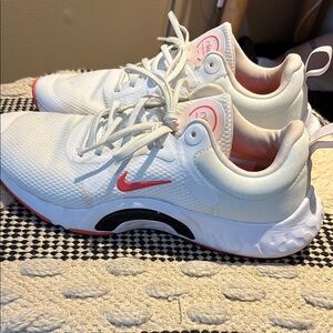 Nike White Running Shoes with Pink Accents